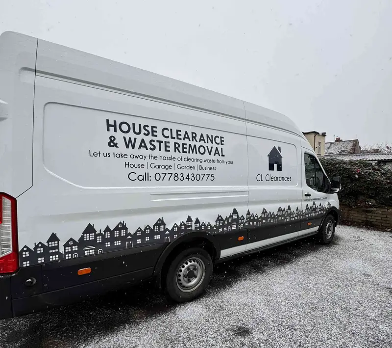 CL Clearances van being loaded during a house clearance