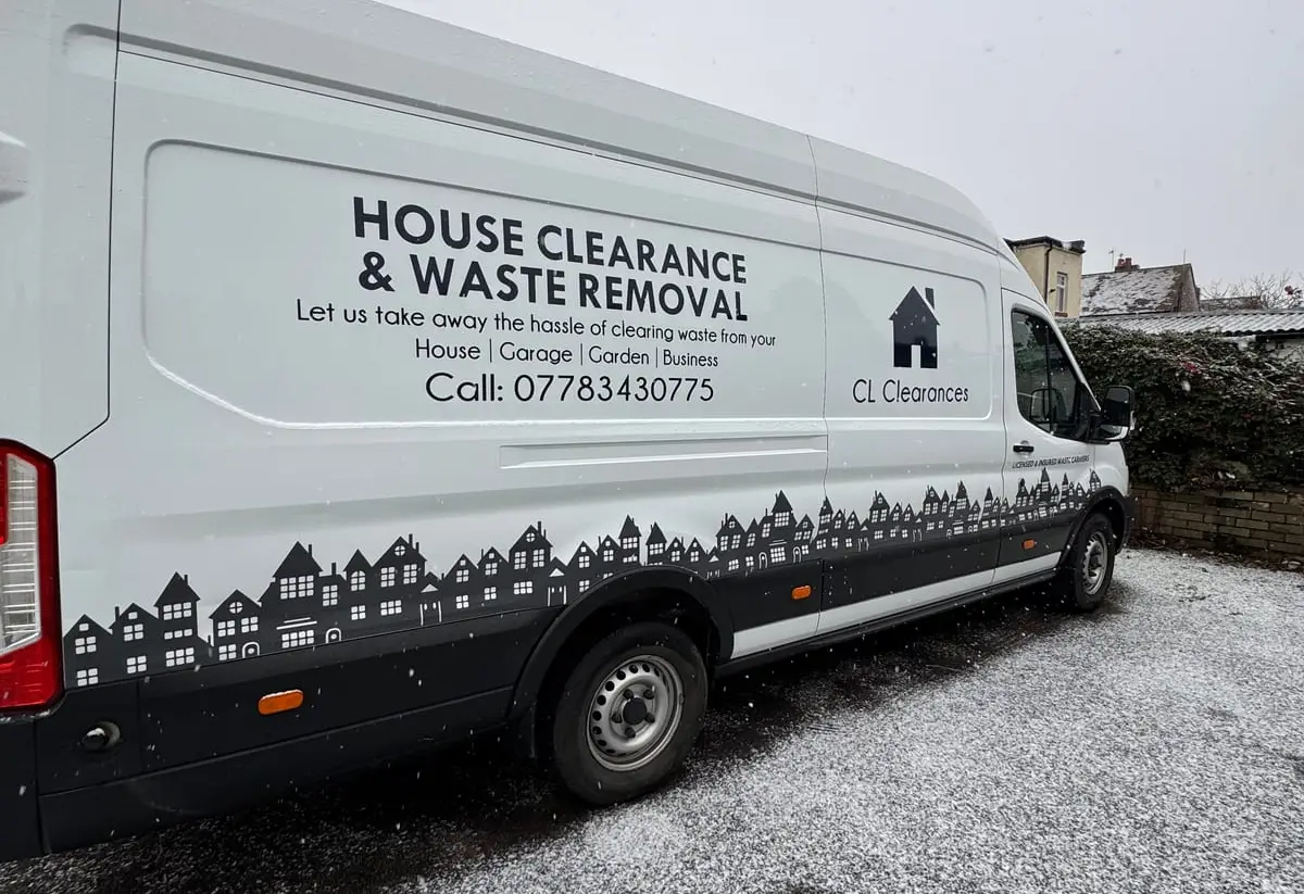 Household items being loaded for a clearance, ready to go to a licensed waste site