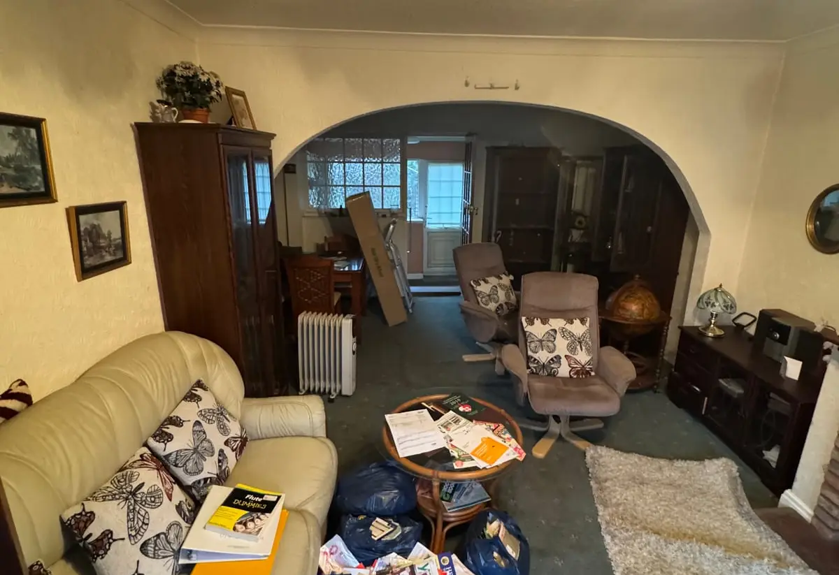 A quiet living room before a bereavement house clearance